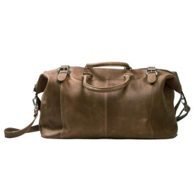 Toro Reisetasche aus hellbraunem Leder. Mit Handgriffen und abnehmbarem Schultergurt.