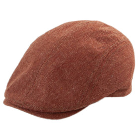 Hochwertige Schiebermütze aus reiner Wildseide in der Farbe Rost.